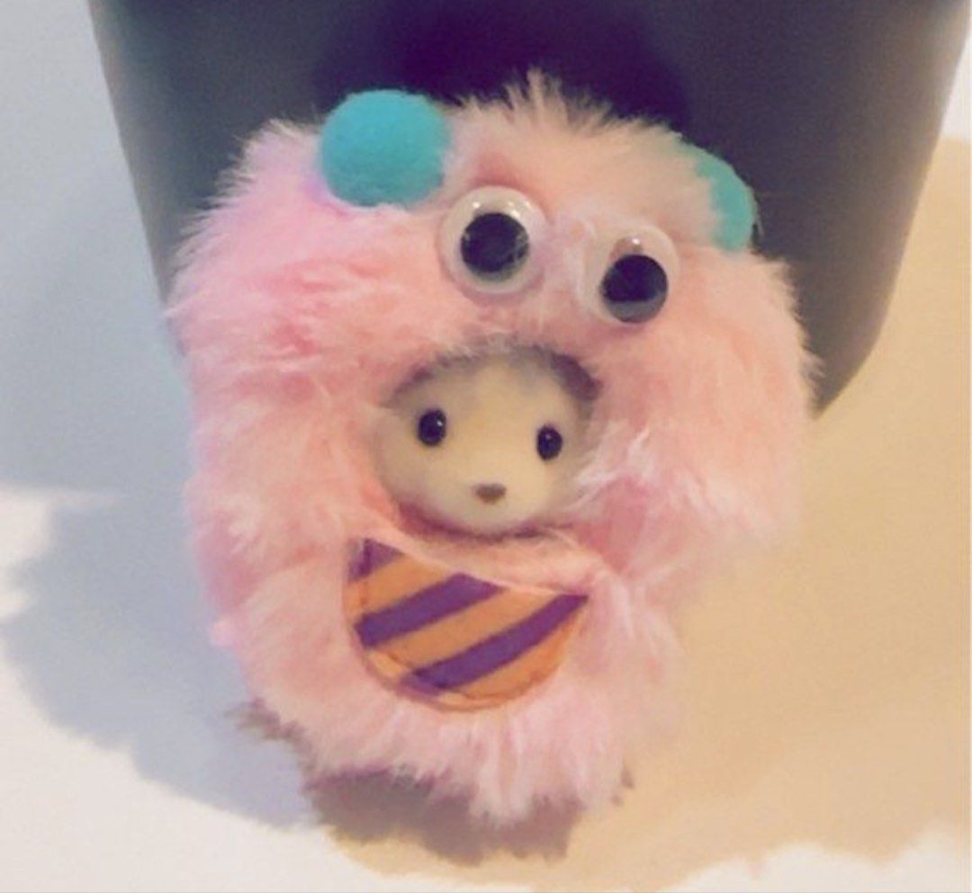 Sylvanian Husky Monster Costume (Category: Plushies & Soft Toys) located in Malabon City. Submitted by alysaleee (Listing ID 1466037258, Image 1). Description: - Adorable fuzzy pink monster costume made with ultra-soft faux fur - Features fun turquoise horns and big, playful googly eyes - Includes a cute little animal figure peeking out from the inside - Designed with a vibrant purple and orange striped front pocket - DM for measurements and inqu