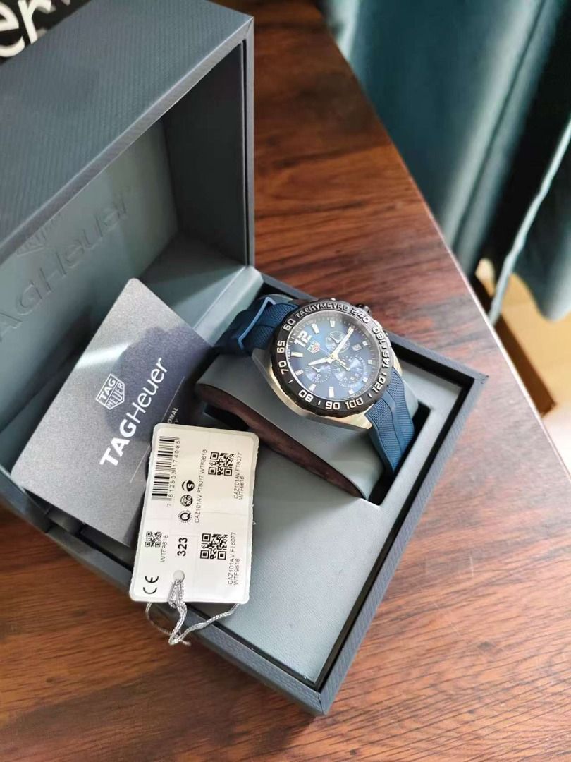 TAG Heuer Formula 1 Blue Chronograph Watch (Category: Luxury Watches) located in Quezon City. Submitted by shilpamour86508 (Listing ID 1466012299, Image 2). Description: - Authentic TAG Heuer Formula 1 Quartz Chronograph - Stunning deep blue dial with a matching textured blue rubber strap - Black tachymeter bezel, three functional subdials, and date window at 4 o'clock - Flawless, scratch-free sapphire crystal - Excellent condition with only mini