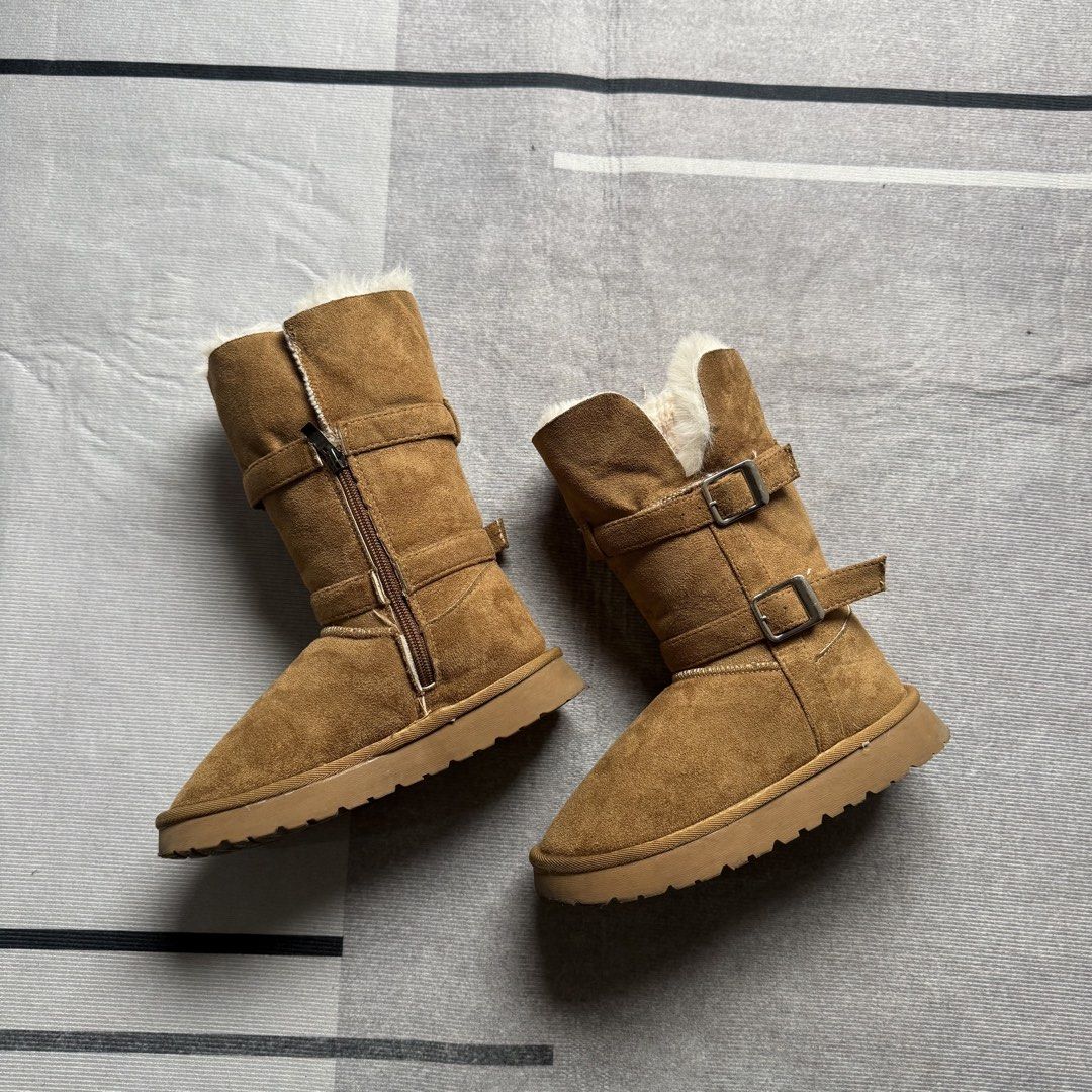 Tan suede mid-calf boots (Category: Babies & Kids Fashion) located in Baguio. Submitted by puss_n_boots2600 (Listing ID 1466149851, Image 2). Description: Size 34 for Kids No Flaws.