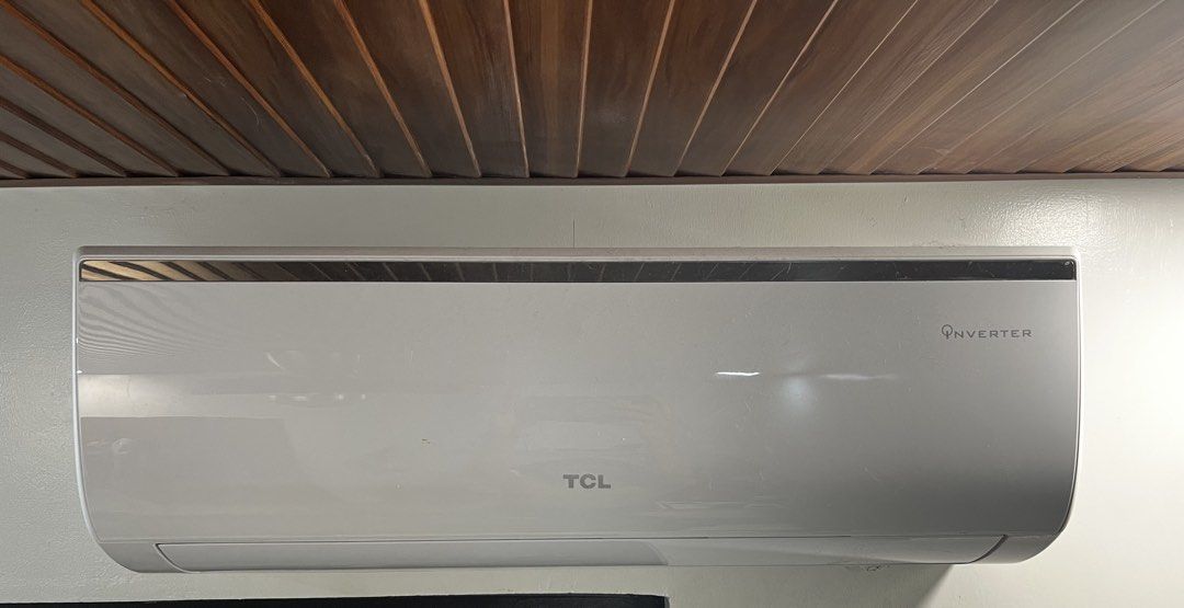 TCL Inverter Air Conditioner Split Type 1HP (Category: Air Conditioning and Heating) located in Las Pinas. Submitted by unwanted.treasures (Listing ID 1466055543, Image 2). Description: - Brand/Model: TCL Split-Type Inverter Air Conditioner - Color: Clean white with stylish metallic accent trim -1 HP - Performance: Cools rooms quickly and operates quietly - Efficiency: Energy-saving inverter motor to lower electricity bills - Inclusions: Indoor w