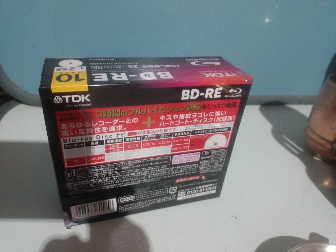 TDK BD-RE 25GB 10 Pack Blu-ray Discs (Category: Blu-Ray & Media Players) located in Munoz. Submitted by larryc1212 (Listing ID 1466127896, Image 2). Description: - Brand: TDK BD-RE Rewritable Discs (10-pack bundle) - Capacity: 25GB per disc - Condition: Brand new, still sealed in original plastic wrap - Speed: 1-2x write speed compatibility - Surface: Printable surface design - Durability: Hardcoat protection layer resists scratches and fingerpri