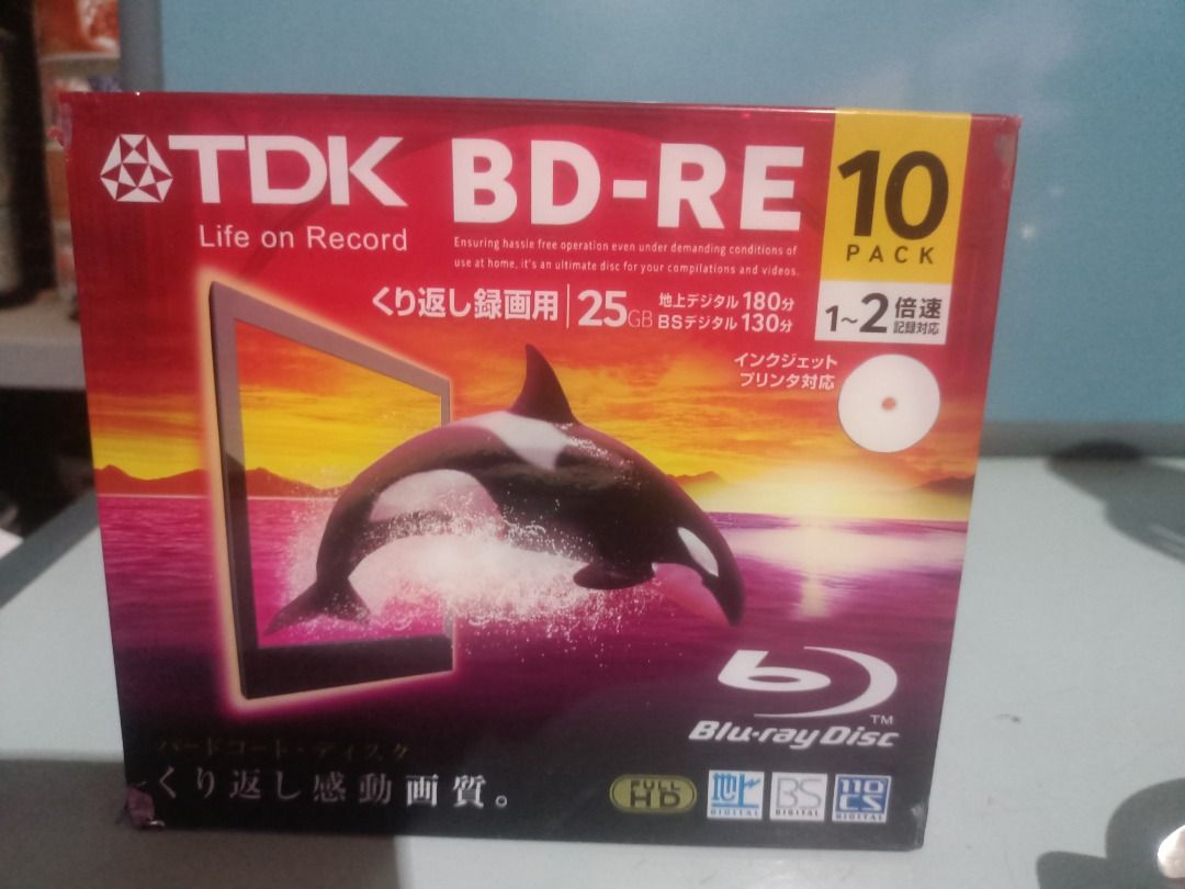 TDK BD-RE 25GB 10 Pack Blu-ray Discs (Category: Blu-Ray & Media Players) located in Munoz. Submitted by larryc1212 (Listing ID 1466127896, Image 1). Description: - Brand: TDK BD-RE Rewritable Discs (10-pack bundle) - Capacity: 25GB per disc - Condition: Brand new, still sealed in original plastic wrap - Speed: 1-2x write speed compatibility - Surface: Printable surface design - Durability: Hardcoat protection layer resists scratches and fingerpri