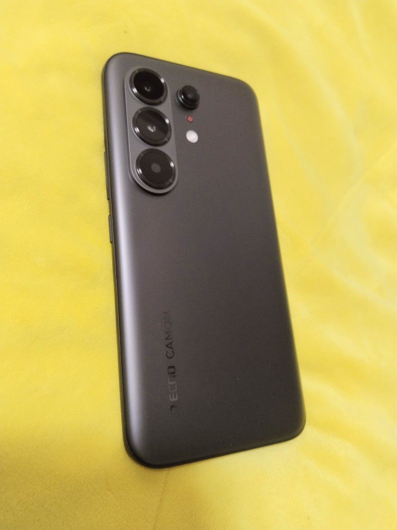 Tecno Camon 50 Ultra 5G (Category: Android Others) located in Manila. Submitted by jherviee.dl08 (Listing ID 1466051757, Image 3). Description: - Tecno Camon 50 Ultra 5G (MoonShadow Black) - 256GB storage and 12GB (12+12) RAM - 50MP Sony camera system with Super-Zoom FlashSnap - Rugged build with IP69K/IP69 water and dust resistance plus Corning protection - Comes complete with its original retail box and accessories in pristine condition Almost 