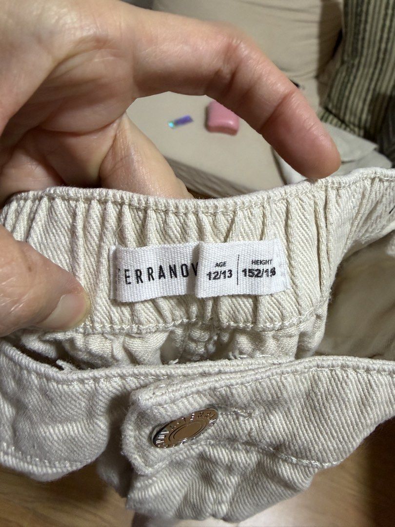 Terranova Beige Cargo Pants Size 12/13 (Category: Jeans) located in Taguig. Submitted by sassie_94 (Listing ID 1466096189, Image 2). Description: - Brand: Terranova - Color: Classic beige - Size: Age 12/13 (Height 152/158) - Fit: High waist with button closure and comfy elastic back waistband - Details: Functional side pockets on both legs and trendy elastic ankle cuffs - Condition: Excellent pre-loved condition .