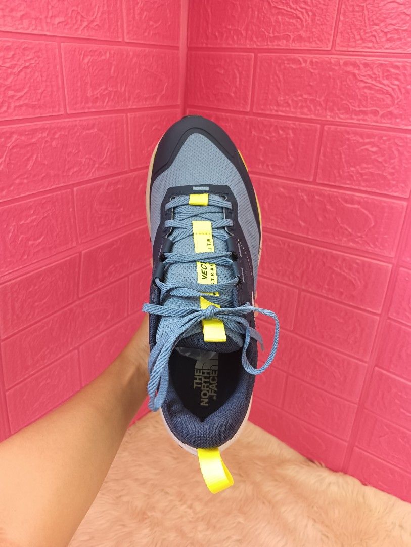 The North Face Fastpack Lite Vectiv Sneakers (Category: Sneakers) located in San Mateo. Submitted by misseic (Listing ID 1466097046, Image 2). Description: With box pa po ito RFS: Masikip sa may-ari, naisukat lang - Brand: The North Face - Model: Fastpack Lite Vectiv - Color: Blue with yellow details - Waterproofing: DryVent technology to keep feet dry - Fit & Lacing: Comfortable fit with quick lace setup - Sole: Sturdy grip sole with excellent b