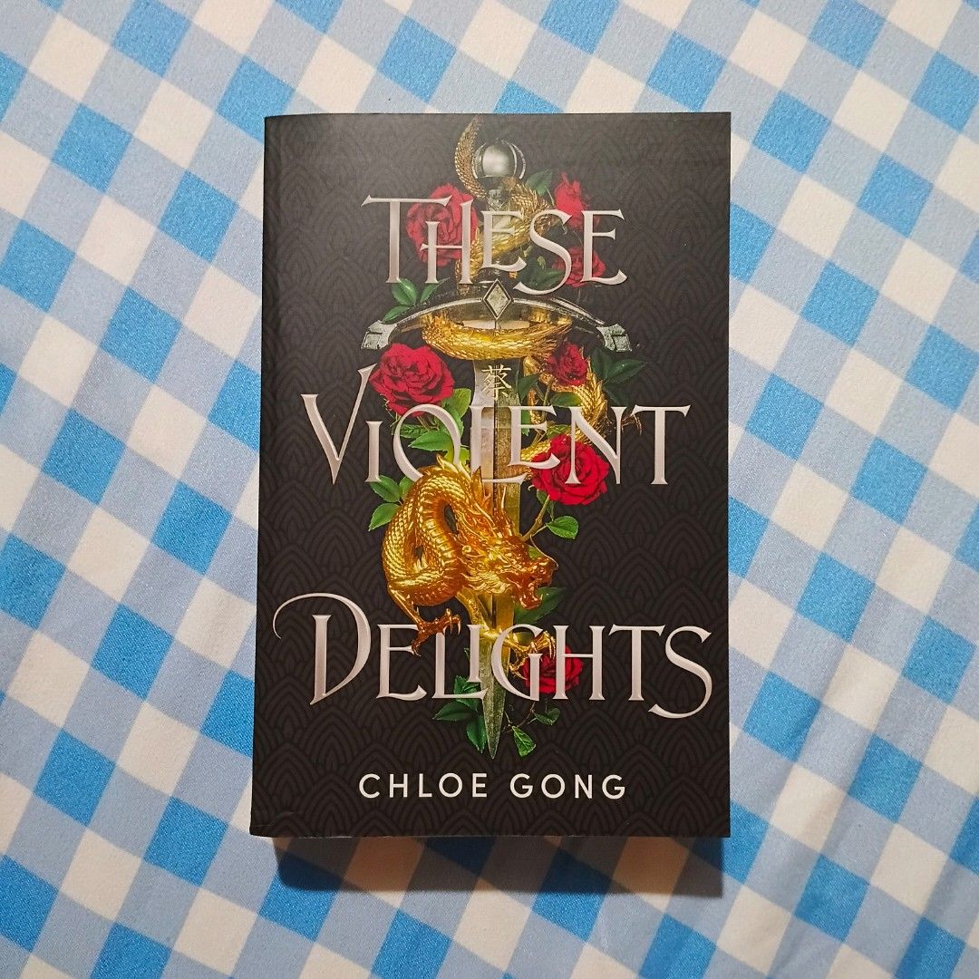 These Violent Delights - Chloe Gong (Category: Storybooks) located in Pagadian. Submitted by aikas_collection (Listing ID 1466014691, Image 1). Description: *Kindly manage your expectations as these books have come from my personal collection. They are NOT brand new and may show normal signs of use. Thank you! Condition: - Tanned pages - Visible wear (minimal dent on spine/cover) PM for additional photos! MOP: GCash.