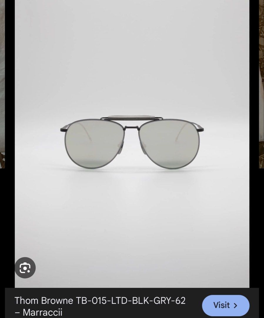 Thom Browne TB-015 LTD Black Grey Sunglasses (Category: Sunglasses & Eyewear) located in Makati City. Submitted by luchingching (Listing ID 1465993271, Image 1). Description: - Brand: Thom Browne - Model: TB-015 Aviator Sunglasses - Color: Black frame with dark grey lenses (subtle mirrored finish) - Design: Double bridge with signature tricolor red, white, and blue temple tips - Craftsmanship: Premium Japanese made luxury eyewear - Inclusions: Or