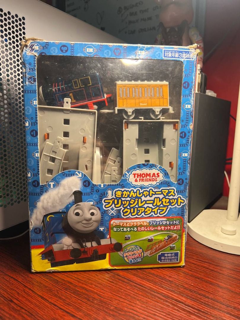 Thomas & Friends Bridge Rail Set Clear Type Plarail (Category: Action & Battle Toys) located in Baguio. Submitted by ditoyzb08176 (Listing ID 1466091534, Image 1). Description: - Item: Thomas and Friends Bridge Rail Set (Clear Type Version) - Condition: Brand new, factory-sealed in original packaging (box shows minor edge/corner wear) - Inclusions: Motorized clear Thomas engine, Clarabel coach, bridge sections, tracks, and support pillars - Power
