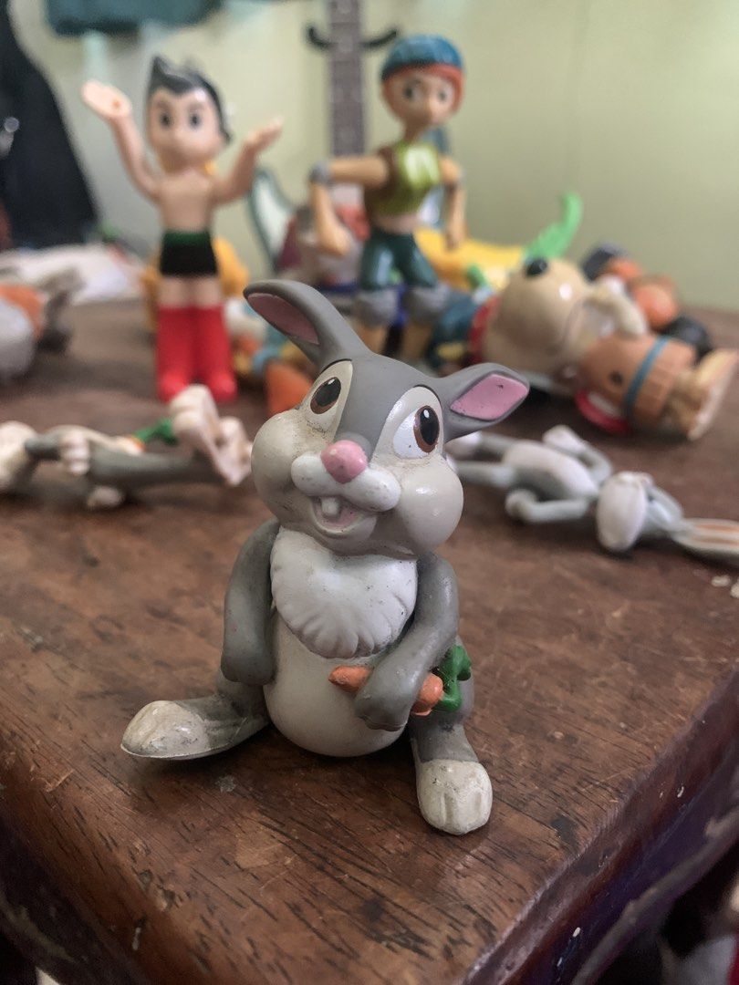 Thumper Rabbit Figurine Disney (Category: Figurines & Statues) located in Makati City. Submitted by emenem.m (Listing ID 1465989110, Image 1). Description: - Item: Disney Thumper Rabbit Figurine holding a carrot - Color: Grey and white with pink ears and nose - Size: Small, ideal for desks and shelves - Condition: Pre-loved with minor scuff marks and dust accumulation from display - Perfect for: Disney fans and collectors.