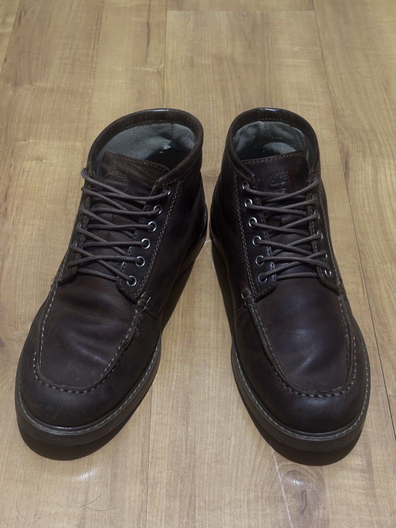 Timberland Moctoe Boots Dark Brown (Category: Boots) located in Manila. Submitted by knshkho (Listing ID 1466087647, Image 3). Description: - Brand: Timberland - Color: Dark Brown - Material: Premium Leather (nubuck) with ReBOTL fabric lining - Design: Moc toe with matching laces and metal eyelets - Details: Debossed tongue logo and heel stamp - Origin: Made in Portugal - Condition: Excellent, well-maintained - repairs done: restitched sole, inso