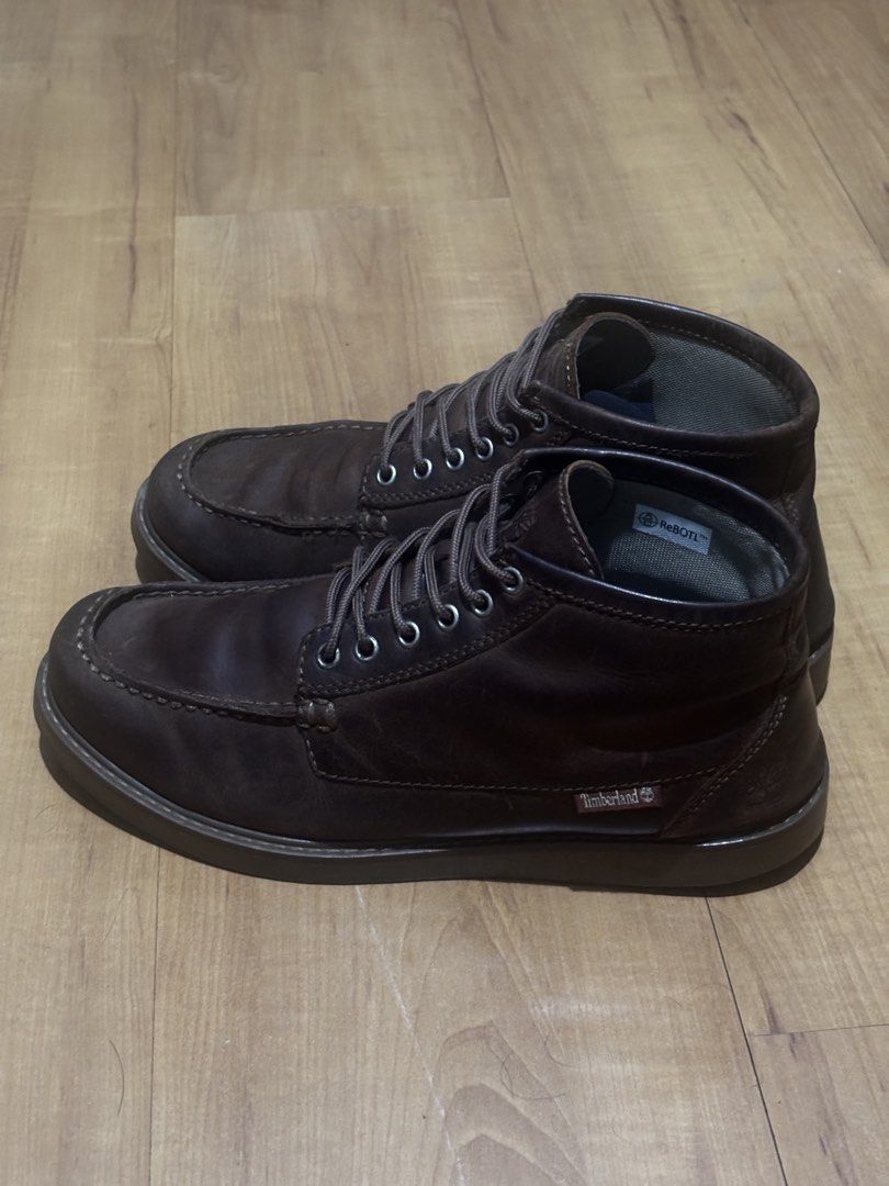 Timberland Moctoe Boots Dark Brown (Category: Boots) located in Manila. Submitted by knshkho (Listing ID 1466087647, Image 2). Description: - Brand: Timberland - Color: Dark Brown - Material: Premium Leather (nubuck) with ReBOTL fabric lining - Design: Moc toe with matching laces and metal eyelets - Details: Debossed tongue logo and heel stamp - Origin: Made in Portugal - Condition: Excellent, well-maintained - repairs done: restitched sole, inso