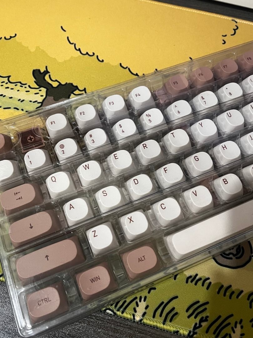 Tiramisu Keycaps (Category: Computer Keyboard) located in Bulacan. Submitted by lexareads (Listing ID 1466151879, Image 1). Description: - 100+ keys - MA profile - brown/white colorway - perfect for thocky builds - comes with free keycap puller.