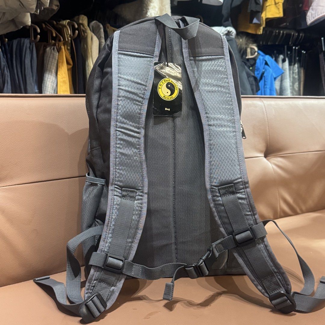 TOC Surf Designs Hawaii ACE Co. Ltd. Backpack Grey (Category: Backpacks) located in Rizal. Submitted by houseofbell (Listing ID 1466150677, Image 2). Description: - Brand: TOC Surf Designs Hawaii (ACE Co. Ltd.) - Color: Grey with stylish geometric pattern on the front pocket - Comfort: Padded adjustable straps with secure sternum clip - Storage: Spacious main compartment, light grey interior with open slip pocket, and convenient mesh side pockets