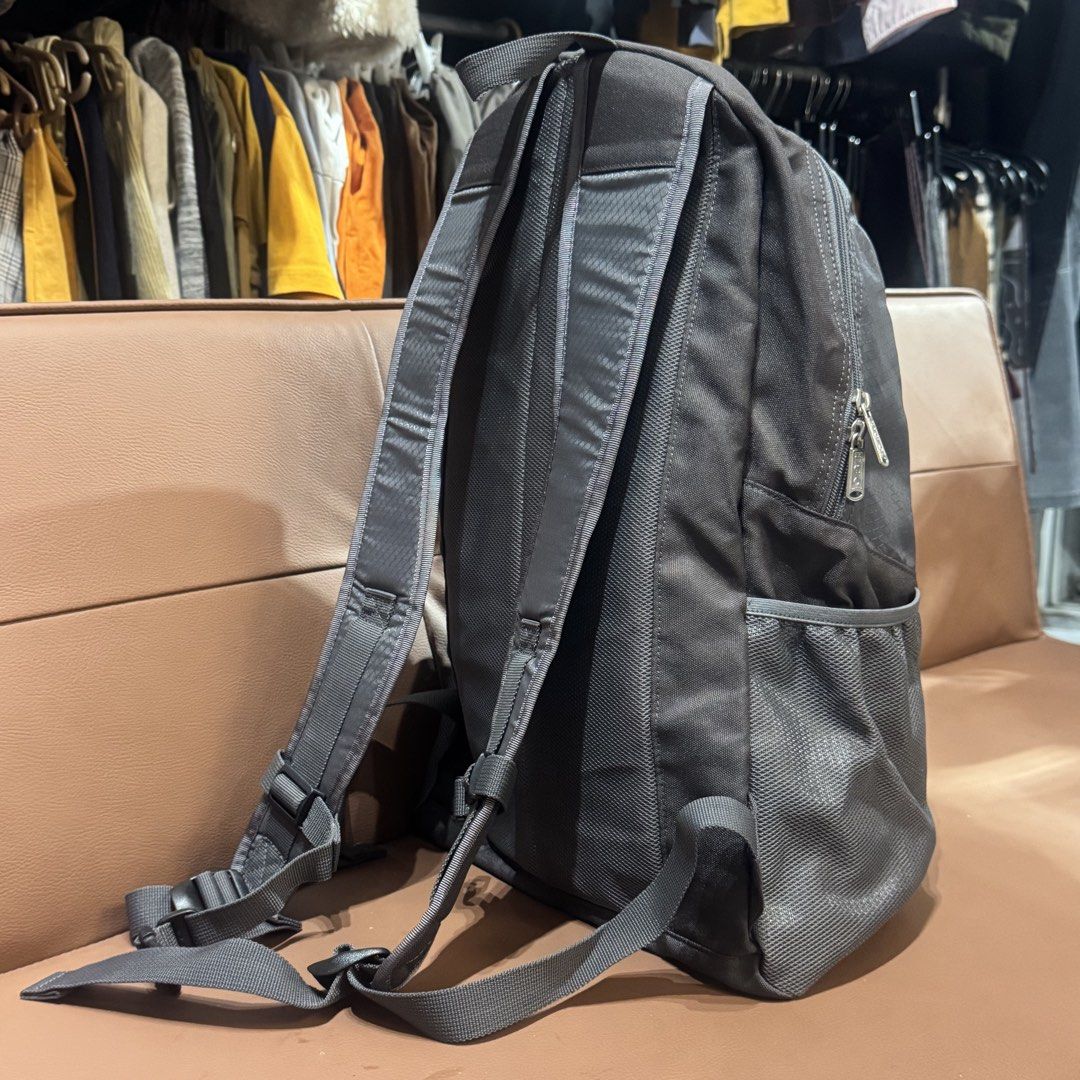 TOC Surf Designs Hawaii ACE Co. Ltd. Backpack Grey (Category: Backpacks) located in Rizal. Submitted by houseofbell (Listing ID 1466150677, Image 3). Description: - Brand: TOC Surf Designs Hawaii (ACE Co. Ltd.) - Color: Grey with stylish geometric pattern on the front pocket - Comfort: Padded adjustable straps with secure sternum clip - Storage: Spacious main compartment, light grey interior with open slip pocket, and convenient mesh side pockets