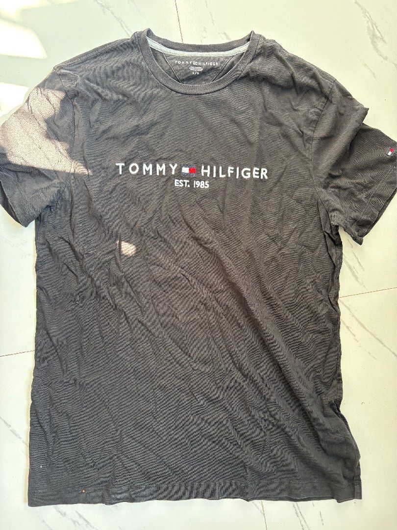 Tommy Hilfiger Black Orig (Category: Tshirts & Polo Shirts ) located in Manila. Submitted by goldenfish-01f0 (Listing ID 1465960362, Image 1). Description: Original Tommy Hilfiger with minimal stains RFS: not using.