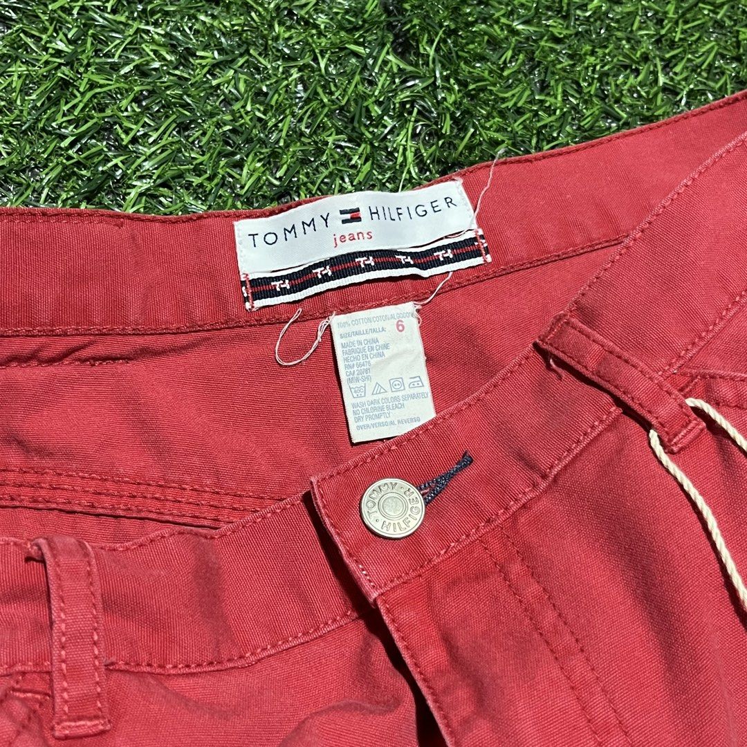 Tommy Hilfiger Carpenter Jorts (Category: Shorts) located in Argao. Submitted by secondcyclecollection (Listing ID 1465961118, Image 3). Description: - Brand: Tommy Hilfiger - Size: Tagged Size 6 - Color: Bright Red - Material: 100% Cotton, Made in China - Features: Utility leg pockets, back hammer loop, branded leather patch, metal button closure with zip fly - Condition: Excellent.