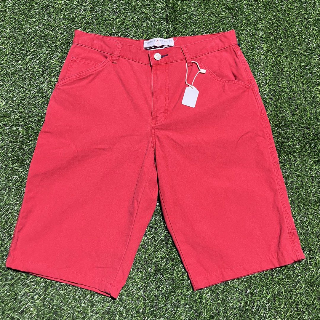 Tommy Hilfiger Carpenter Jorts (Category: Shorts) located in Argao. Submitted by secondcyclecollection (Listing ID 1465961118, Image 2). Description: - Brand: Tommy Hilfiger - Size: Tagged Size 6 - Color: Bright Red - Material: 100% Cotton, Made in China - Features: Utility leg pockets, back hammer loop, branded leather patch, metal button closure with zip fly - Condition: Excellent.