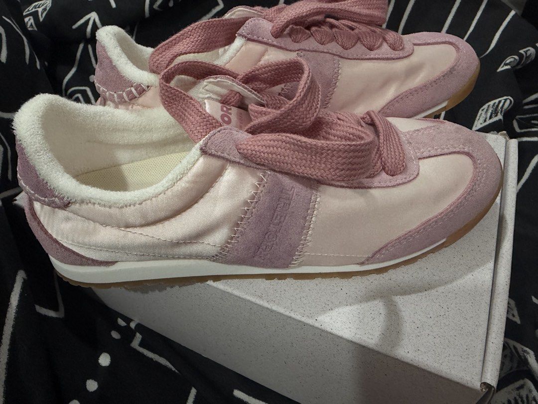 Tretorn Pink Suede Platform Sneakers 38 (Category: Sneakers) located in Pasig City. Submitted by hellokittydei (Listing ID 1465994546, Image 2). Description: - Brand: Tretorn Sneakers size 38 / US 7 women - Color: Shades of Pink - Material: Premium suede and nylon upper - Comfort: Soft white fleece lining inside the collar and heel - Details: Thick textured laces and signature Tretorn branding on side, tongue, heel patch, and insoles - Outsole: G