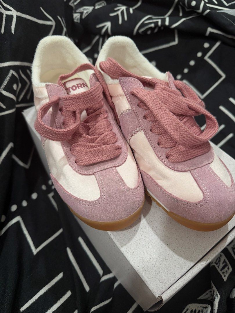 Tretorn Pink Suede Platform Sneakers 38 (Category: Sneakers) located in Pasig City. Submitted by hellokittydei (Listing ID 1465994546, Image 1). Description: - Brand: Tretorn Sneakers size 38 / US 7 women - Color: Shades of Pink - Material: Premium suede and nylon upper - Comfort: Soft white fleece lining inside the collar and heel - Details: Thick textured laces and signature Tretorn branding on side, tongue, heel patch, and insoles - Outsole: G