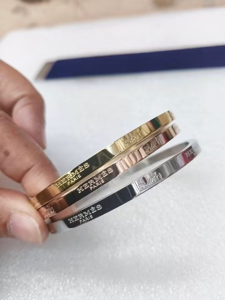 Tricolor bangle (Category: Bracelets) located in Manila. Submitted by celstainlessjewelry (Listing ID 1466136139, Image 2). Description: Tricolor bangle Hypoallergenic quality No faded Non tarnish With box and paper.
