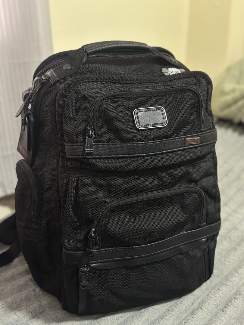 TUMI Alpha 2 T-Pass Business Class Brief Pack (Category: Luxury Bags & Wallets) located in Baguio. Submitted by annecicat (Listing ID 1466053016, Image 1). Description: - Tumi Alpha 2 Backpack (Model: 2603578D) - Color: Sleek Black - Material: Ultra-durable ballistic nylon with genuine leather handle - TSA Checkpoint-Friendly: Laptop compartment zips fully open for easy airport security screening - Storage: Multiple exterior zipped pockets and in