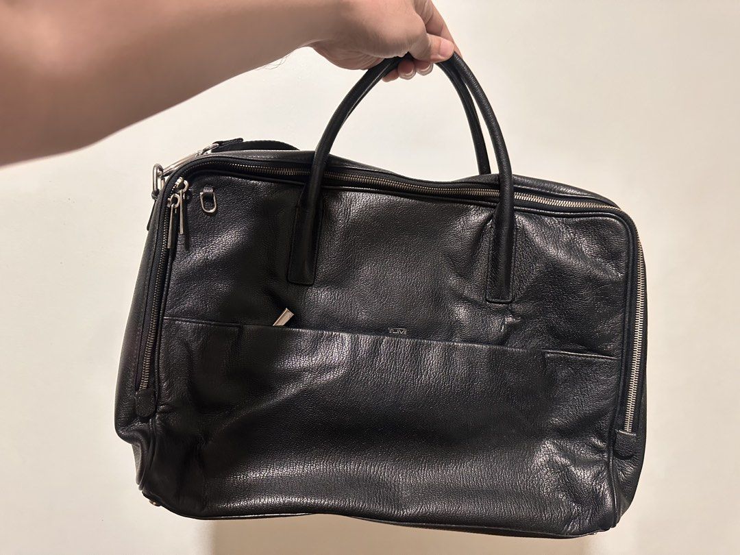 TUMI black pebbled-leather briefcase (Category: Briefcases) located in Makati City. Submitted by coachjohndizon (Listing ID 1466104743, Image 1). Description: Sale!! TUMI black pebbled-leather briefcase. Lightly used. I want to buy a new bag. Let me know lang if you want more pics..