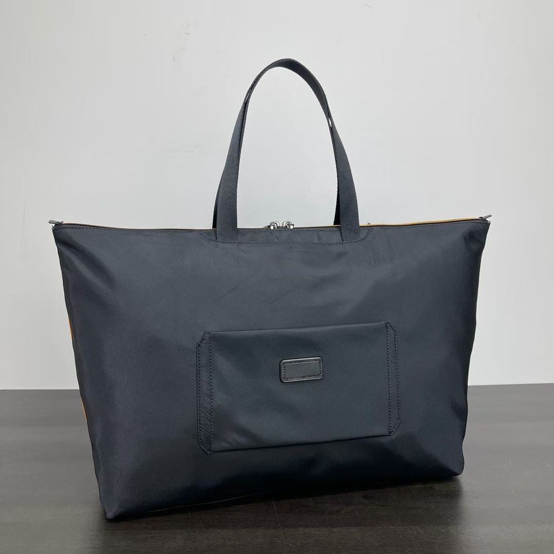 Tumi Mclaren Just in Case Tote (Category: Tote Bags) located in Manila. Submitted by bagmaniaph (Listing ID 1466126098, Image 3). Description: Designed to be completely packable, the Just In Case tote bag from TUMI’s collection folds flat for maximum convenience. It can also be stored within its accompanying pouch. This premium take on our popular Just In Case® tote features McLaren’s automotive-inspired design. It folds flat for easy storage ins