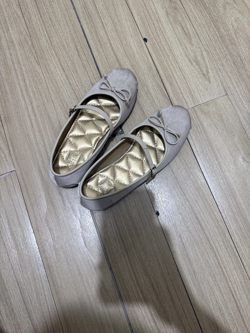 Tutu Toe Beige Quilted Mary Jane Flats (Category: Flats & Sandals) located in Manila. Submitted by thesavlsqz (Listing ID 1465995037, Image 1). Description: - Brand: Tutu Toe - Size: 35 - Color: Beige - Details: Soft quilted gold inner sole, cute strap, and front bow detail - Condition: Noticeable wear and scuff marks on the front toes and soles from regular use - Best for: Casual daily wear and budget-conscious buyers.