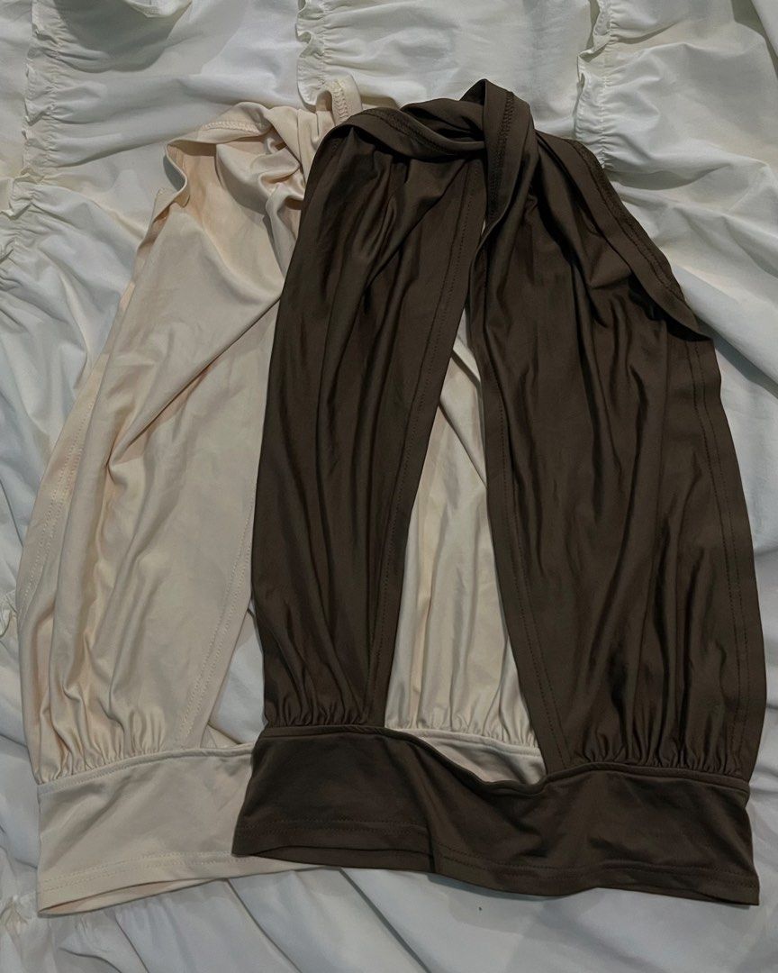 Twist halter top bundle in brown and cream (Category: Sleeveless) located in Kapalong. Submitted by elleclo (Listing ID 1466048591, Image 1). Description: - Set of 2 halter tops: Dark Brown and Light Cream - Selling as a set only.