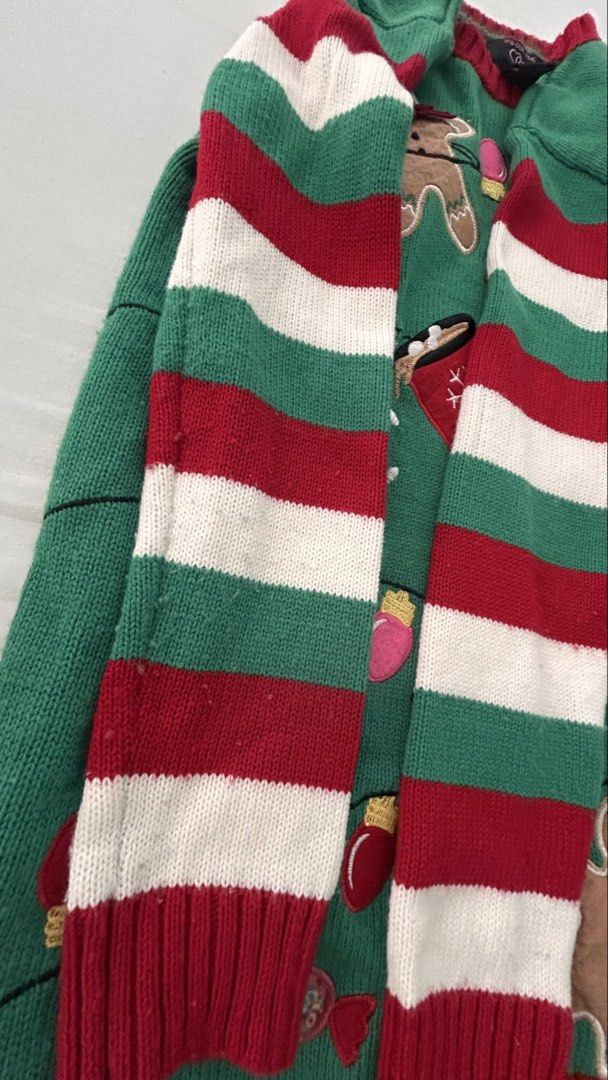 Ugly Christmas Sweater size M (Category: Coats, Jackets and Outerwear) located in Kawit. Submitted by apuchiko (Listing ID 1465971485, Image 3). Description: Sweater with ginger bread cookie and other Christmas decorative design. Size M (women). Best for Christmas themed parties. Bought from Costco USA..