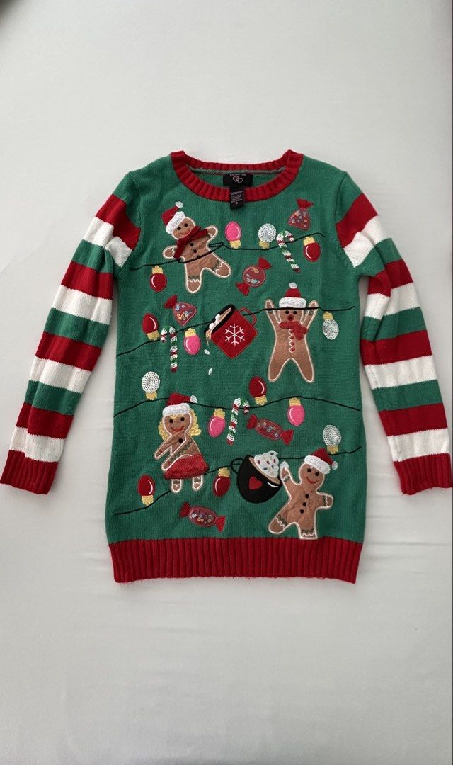 Ugly Christmas Sweater size M (Category: Coats, Jackets and Outerwear) located in Kawit. Submitted by apuchiko (Listing ID 1465971485, Image 1). Description: Sweater with ginger bread cookie and other Christmas decorative design. Size M (women). Best for Christmas themed parties. Bought from Costco USA..