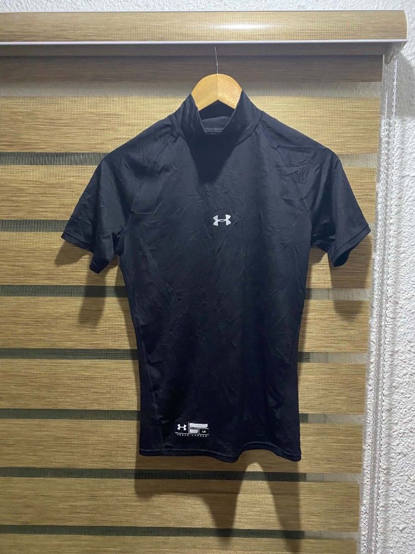 Under Armour Black Short Sleeve Mock Neck Compression Shirt (Category: Activewear) located in Davao. Submitted by drayliii (Listing ID 1466064713, Image 3). Description: UA compression shirt Size large Good as new 380 add ship - Brand: Under Armour - Item: Men's compression top - Color: Black with white logo - Size: Large - Fit: Snug, stretchy fabric - Design: Short sleeves, mock neck collar, lower hem label - Ideal for: Workouts, running, or spo