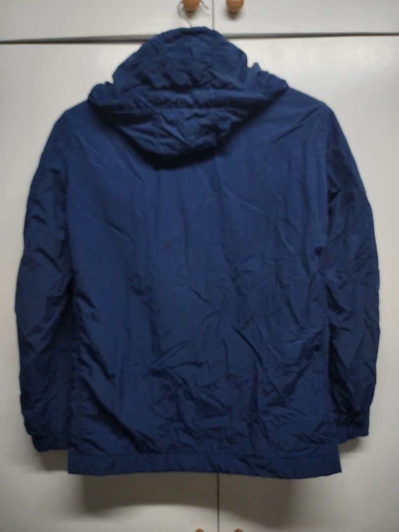 Uniqlo Blue Parka Jacket Size S (Category: Coats, Jackets and Outerwear) located in Manila. Submitted by ybn15 (Listing ID 1466120642, Image 3). Description: - Color: Blue - Pristine color condition - Size: Small (S) - Closure: Front zipper - Features: Hooded, front pockets, stylish grey lining, and button accents - Material: Lightweight outer fabric - Condition: Clean overall look - Best for: Everyday layering and breezy weather.