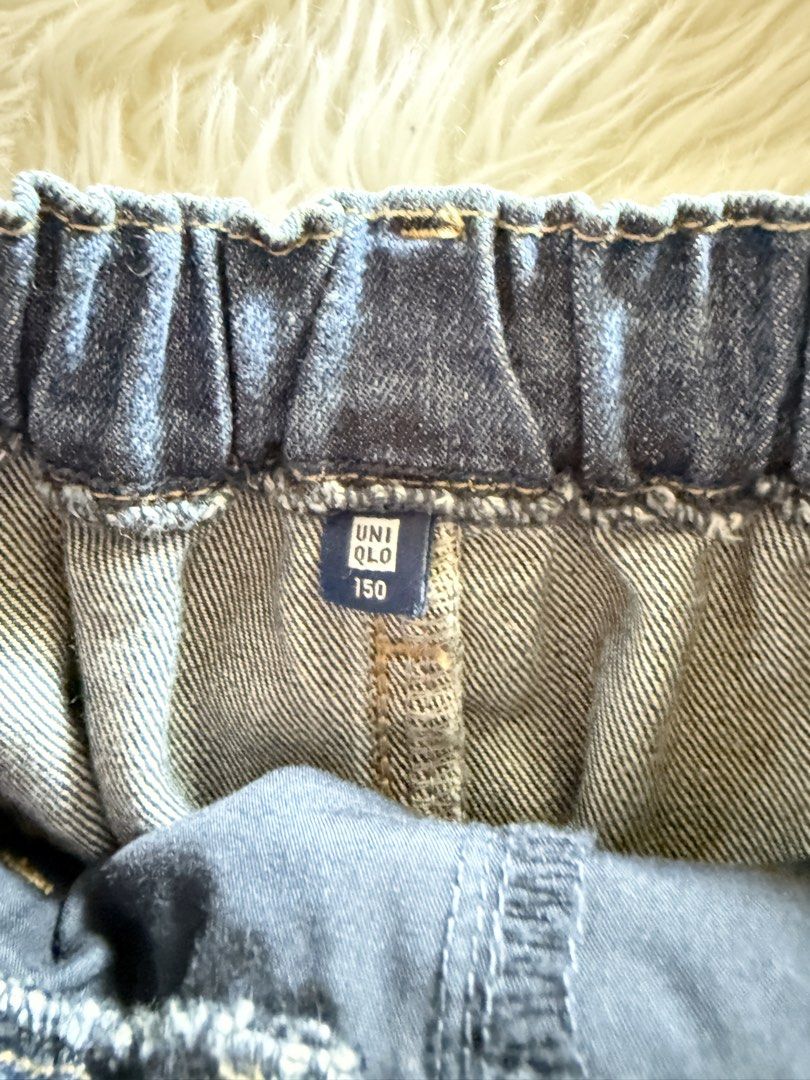 Uniqlo Denim Skort Size S (Category: Skirts) located in Davao. Submitted by keirousel (Listing ID 1466034206, Image 2). Description: - Brand: Uniqlo - Item: Denim skirt with built-in shorts - Color/Wash: Dark blue - Size: 150 (tag inside) - Waistband: Elastic at the back - Closure: Front button closure down the middle - Pockets: Functional pockets on the front.