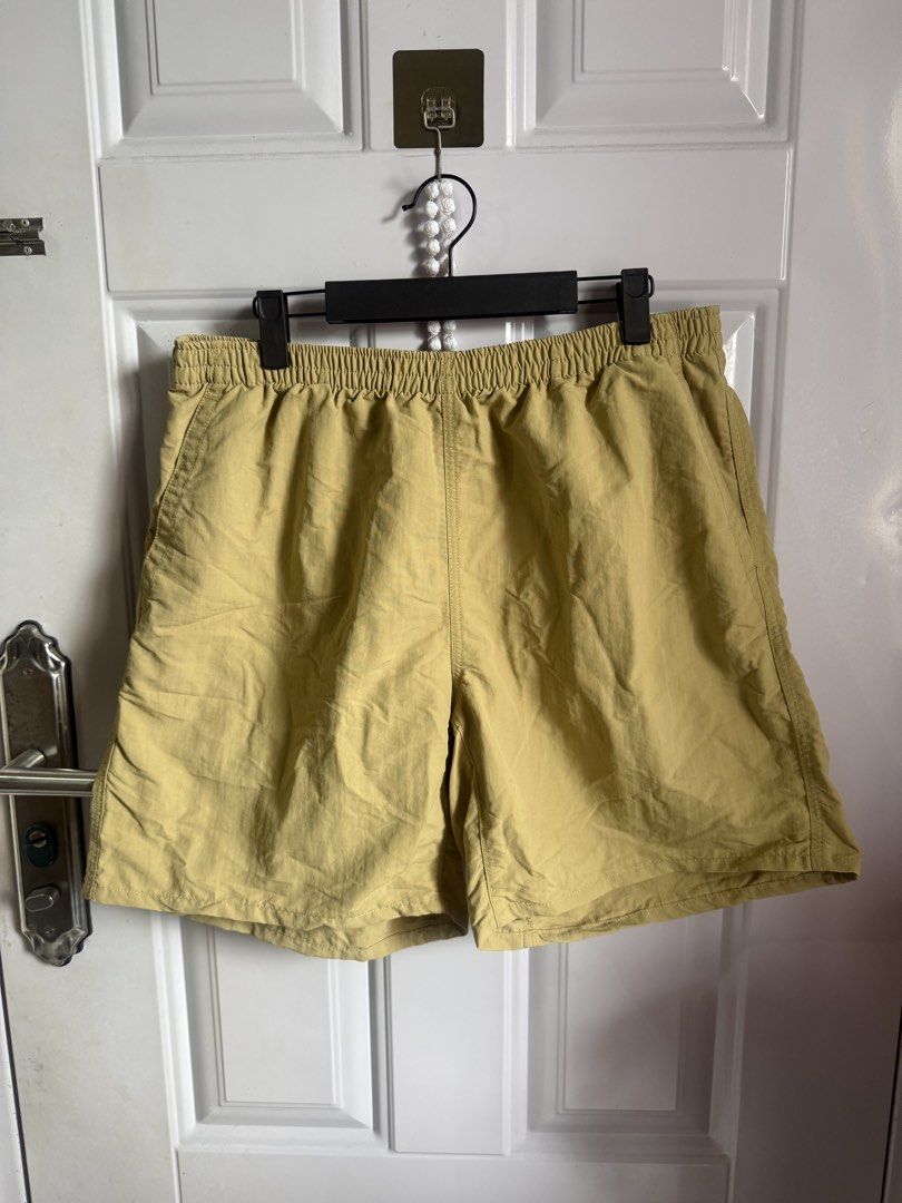 UNIQLO Swimming Shorts (Category: Swim Trunks & Board Shorts) located in Las Pinas. Submitted by sellerkjb (Listing ID 1466153663, Image 3). Description: PRELOVED - 100% nylon fabric with added water-repellent function. - Amphibious shorts for the town or the beach. - Easy pull-on design. - Swimwear details include drainage holes in the back pockets. - Comes with a key cord. - Above-the-knee length for easy movement. - These amphibious shorts are
