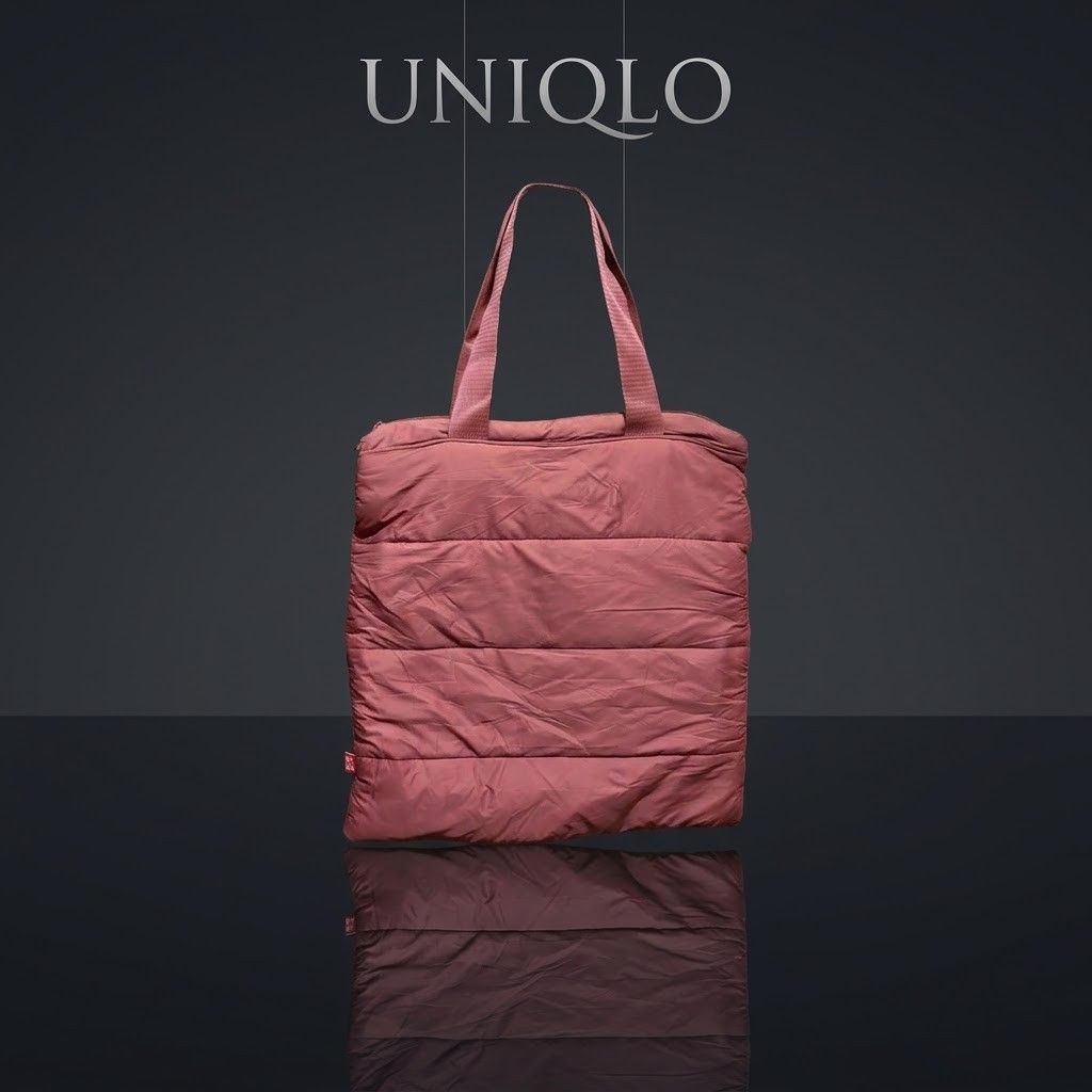 Uniqlo Tote Bag (Category: Tote Bags) located in Carmen. Submitted by aquarius.00 (Listing ID 1466055253, Image 1). Description: puffer tote bag like new ykk zip.