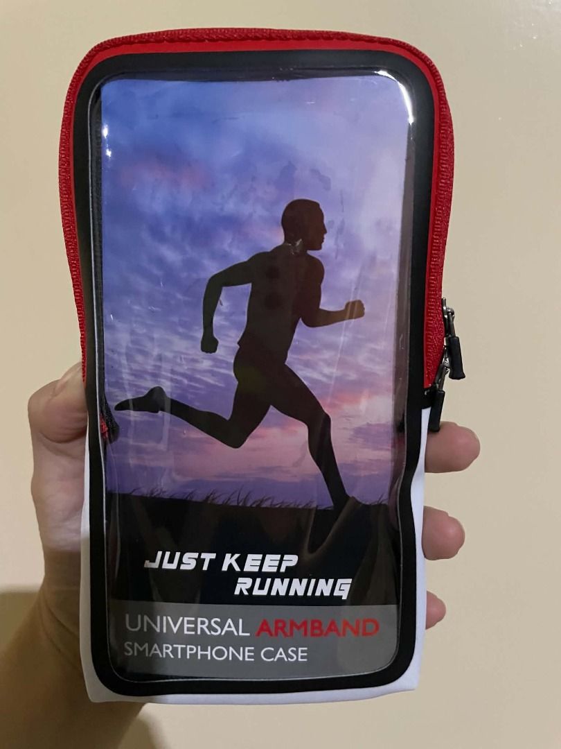 Universal Armband Smartphone Case Pokémon Run (Category: Cases & Sleeves) located in Manila. Submitted by jco05 (Listing ID 1466090152, Image 1). Description: - Official Pokémon Run merchandise - Clear plastic front window for easy phone screen access - Breathable black mesh backing for comfortable workouts - Adjustable black strap for a secure arm fit - Stylish red and white outer trim design.