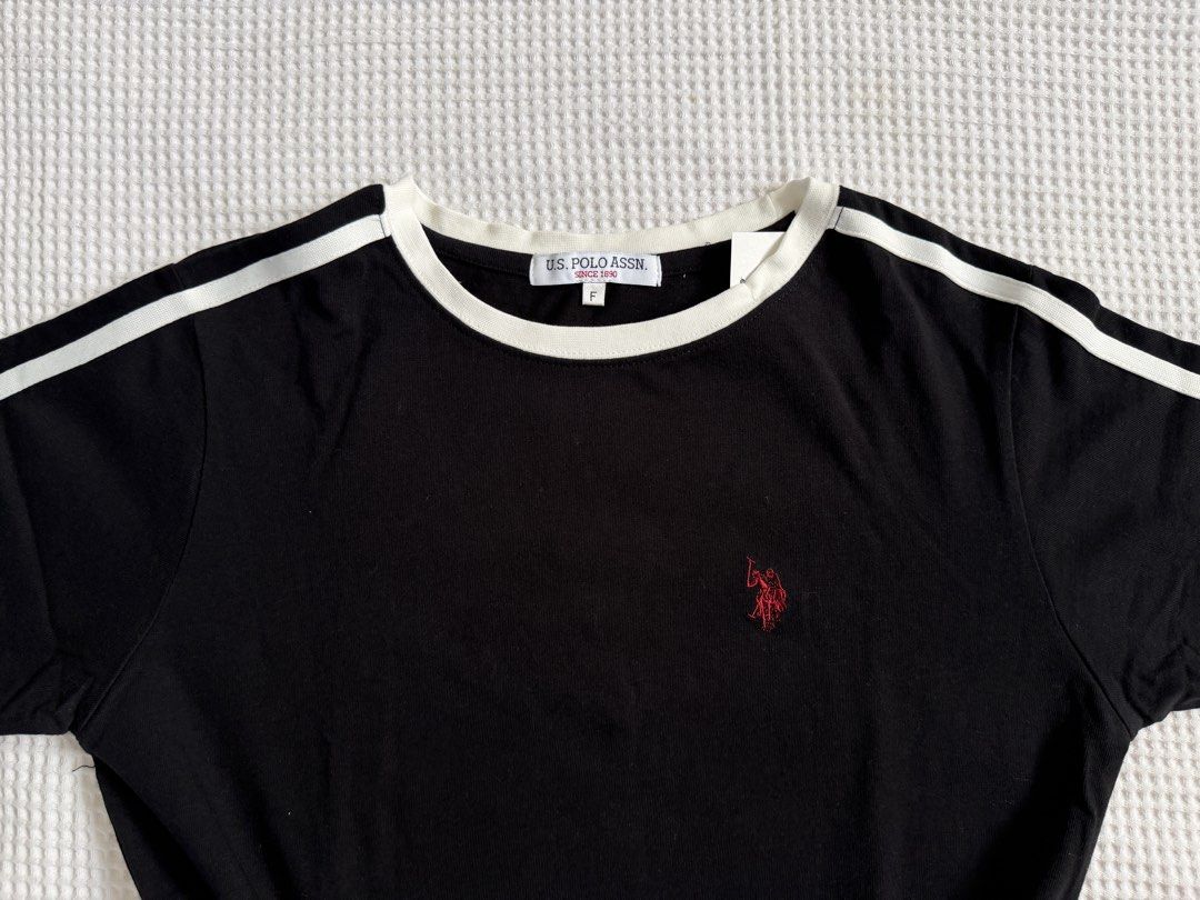 U.S. Polo Assn. Tee (Category: Tshirts & Polo Shirts ) located in Baguio. Submitted by blnxxx (Listing ID 1466095490, Image 2). Description: - Brand new - Authentic U.S. Polo Assn. black t-shirt - Signature red embroidered logo on the chest - Freesize on tag.