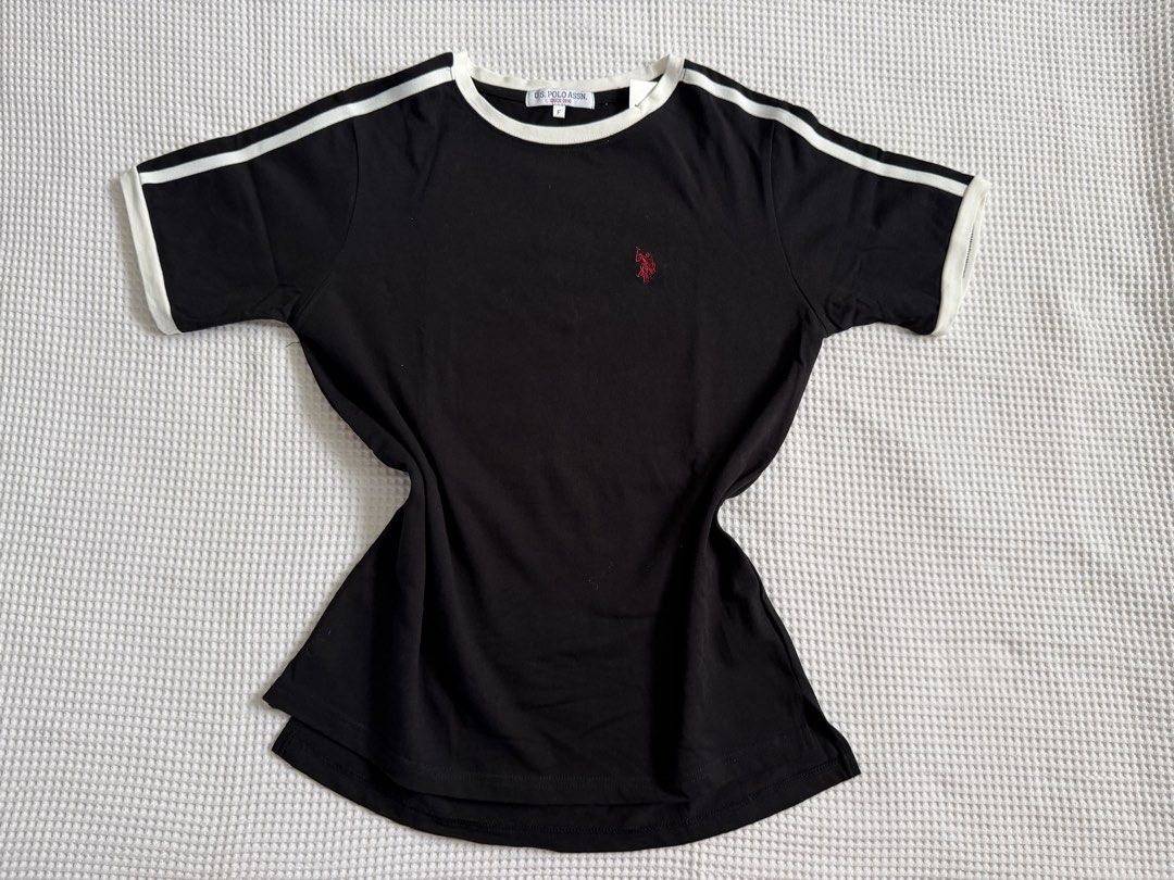U.S. Polo Assn. Tee (Category: Tshirts & Polo Shirts ) located in Baguio. Submitted by blnxxx (Listing ID 1466095490, Image 1). Description: - Brand new - Authentic U.S. Polo Assn. black t-shirt - Signature red embroidered logo on the chest - Freesize on tag.