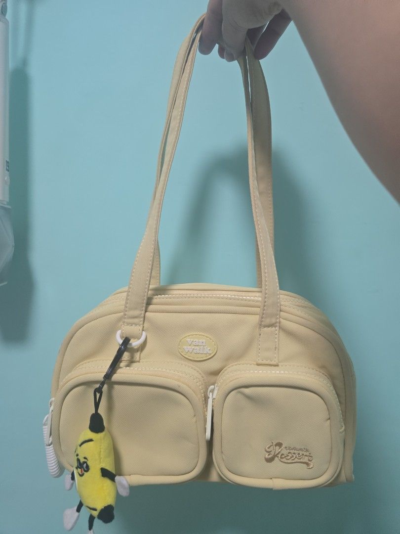 Vanwalk Shoulder bag (Category: Shoulder Bags) located in Malolos. Submitted by bueeens (Listing ID 1465970921, Image 1). Description: original vanwalk vanilla yellow shoulder bag slightly used but was stored for a long time. with slight darkening on the straps. all zippers are functioning originally bought for 1.3k+.