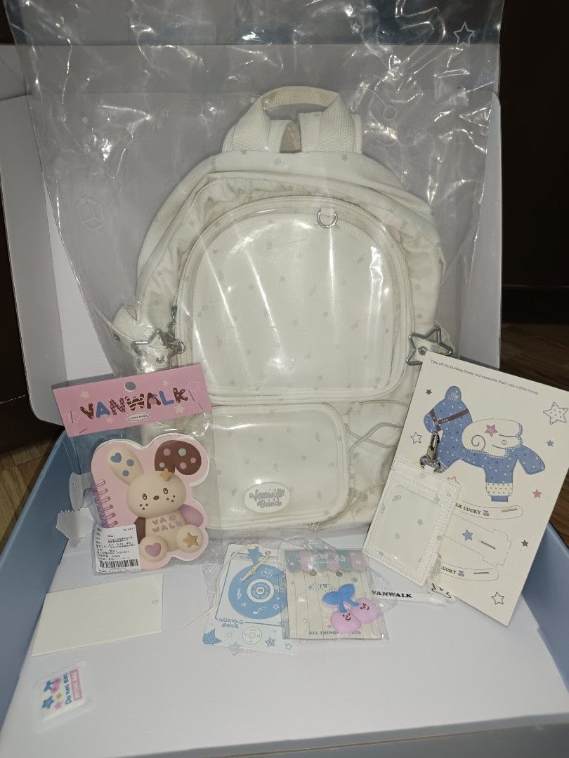 Vanwalk White Ita Backpack With Cute Accessories Gift Box (Category: Backpacks) located in Las Pinas. Submitted by cute.thingz (Listing ID 1466071552, Image 1). Description: PRICE BOUGHT: 1,700 SELLING PRICE: 1,300 - Like new and in original packaging, comes in a special gift box with the freebies from Vanwalk. - Material: Durable polyester fabric with a subtle star pattern - Dimensions: 39cm (H) x 25.5cm (L) x 13cm (W) - Capacity: Fits up to a 1