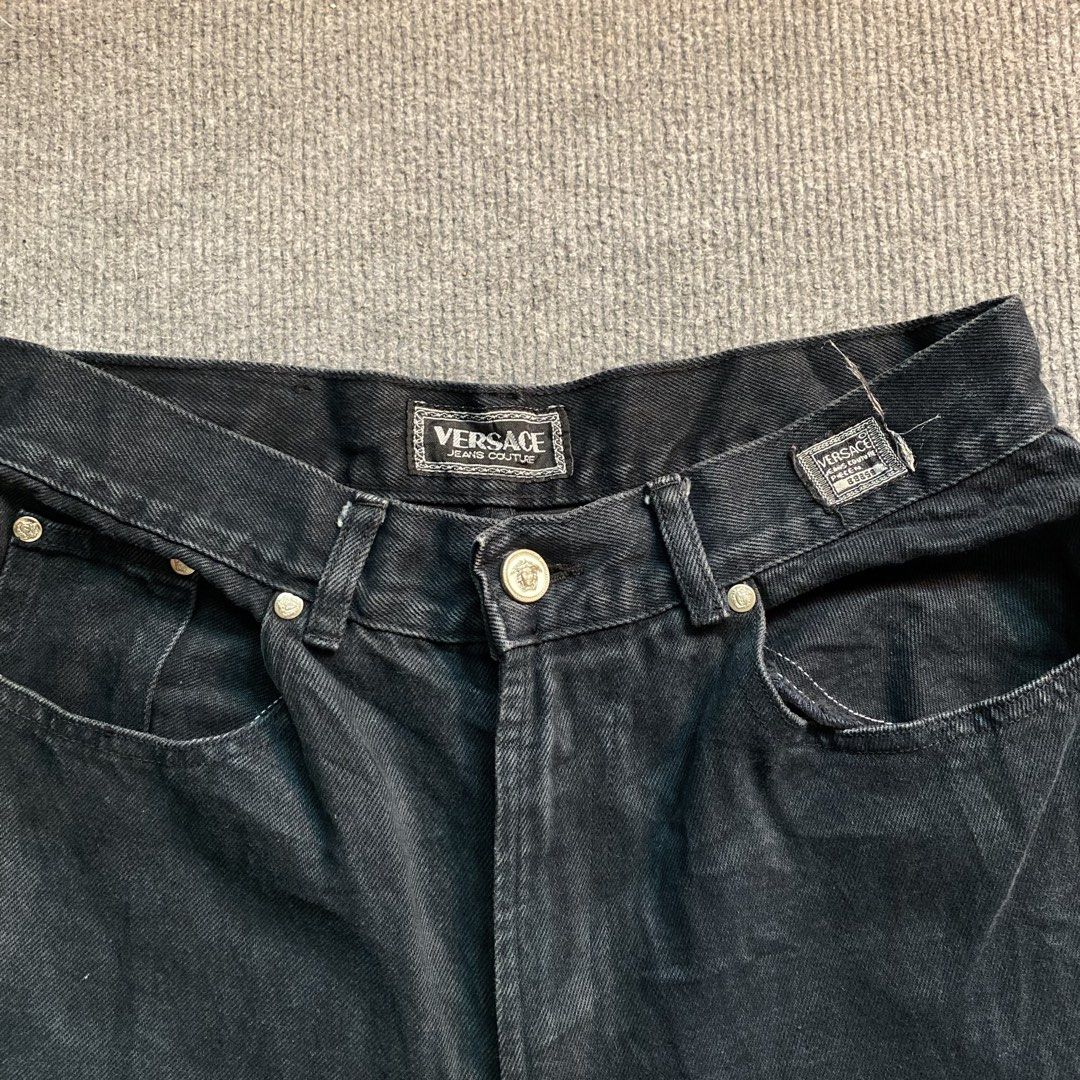 Versace Jeans Couture Black Denim Pants (Category: Jeans) located in Malaybalay. Submitted by mat.loots (Listing ID 1466087784, Image 3). Description: Black denim jeans from Versace Jeans Couture. Thick material, classic five-pocket design. Includes branded metal button closure and logo patches on the back waistband and back pocket. ITTIERRE S.p.A. authentication tag inside. Relaxed fit with wide legs..