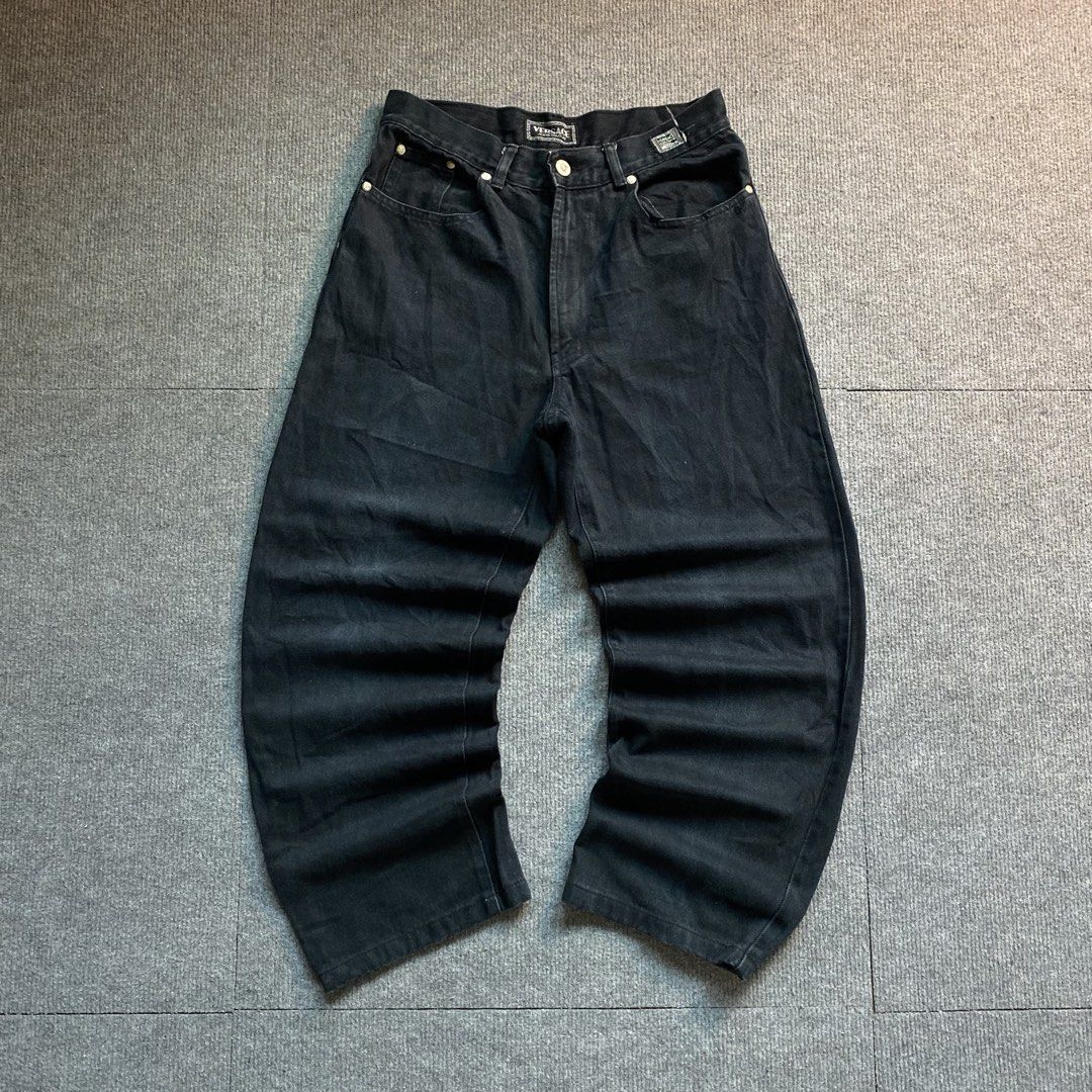 Versace Jeans Couture Black Denim Pants (Category: Jeans) located in Malaybalay. Submitted by mat.loots (Listing ID 1466087784, Image 1). Description: Black denim jeans from Versace Jeans Couture. Thick material, classic five-pocket design. Includes branded metal button closure and logo patches on the back waistband and back pocket. ITTIERRE S.p.A. authentication tag inside. Relaxed fit with wide legs..