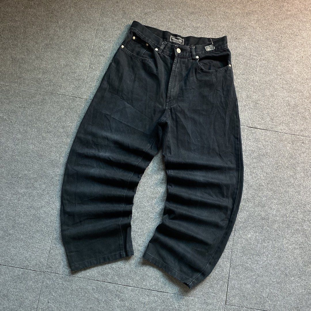 Versace Jeans Couture Black Denim Pants (Category: Jeans) located in Malaybalay. Submitted by mat.loots (Listing ID 1466087784, Image 2). Description: Black denim jeans from Versace Jeans Couture. Thick material, classic five-pocket design. Includes branded metal button closure and logo patches on the back waistband and back pocket. ITTIERRE S.p.A. authentication tag inside. Relaxed fit with wide legs..