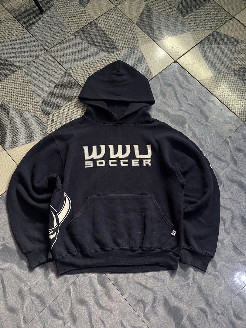 Vibtage Russell athletic (Category: Hoodies) located in Quezon City. Submitted by thriftshop_treasure (Listing ID 1466107116, Image 2). Description: vintage navy blue Russell Athletic hoodie featuring a bold WWU Soccer chest graphic and a striking Viking mascot accent along the lower side. 23x26.