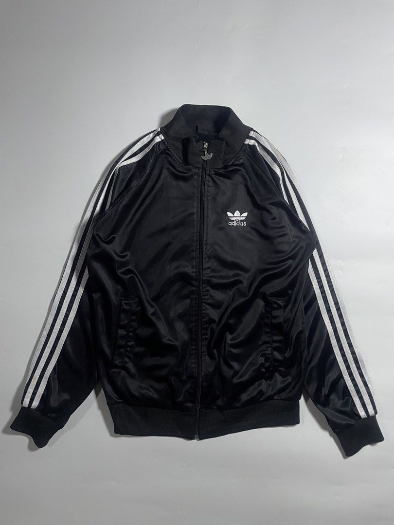 Vintage adidas track jacket (Category: Coats, Jackets and Outerwear) located in Bais. Submitted by christian.complexthrift08 (Listing ID 1466081025, Image 1). Description: Vintage Adidas track jacket (In excellent Condition) Color: black / white Size: small best fit Width: 20.5 inches Length: 24 inches Condition: 9.5 / 10 Issue: barely noticeable signs of usage Price: 550 + SF Via JNT express.