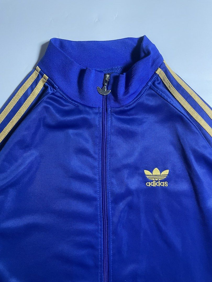 Vintage Adidas track jacket (Category: Coats, Jackets and Outerwear) located in Bais. Submitted by christian.complexthrift08 (Listing ID 1466086020, Image 2). Description: Vintage Adidas track jacket (In excellent condition) Color: blue / gold Size: X Large on tag Width: 22.5 inches Length: 28 inches Condition: 9.5 / 10 Issue: Price: 650 + 79 shipping fee Via JNT express.