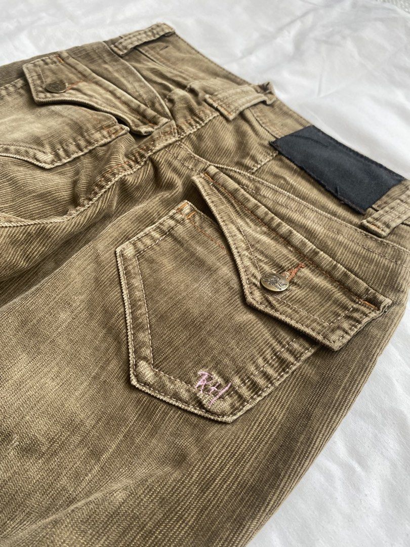 Vintage Brown Corduroy Cargo Flared Pants (Category: Jeans) located in Manila. Submitted by vestige_collection (Listing ID 1466088061, Image 3). Description: Brown corduroy pants, flared cut at the bottom. Front flap pockets with metal button details. Mid-rise waist fit with belt loops. Fine wale texture throughout the fabric. Earthy tone, easy to match with tees or sweaters. Great vintage aesthetic..
