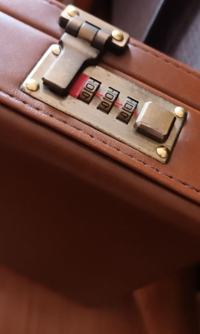 Vintage Brown Leather Attache Case (Category: Briefcases) located in Quezon City. Submitted by happyvintage49 (Listing ID 1466104532, Image 3). Description: - Vintage Samsonite attache case - Stylish all-brown exterior finish - Clean brown and light fabric interior with built-in organizers - Built-in combination lock for security - Perfect for work, meetings, and safekeeping of important/confidential documents - Also perfect for retro OOTDs Note:
