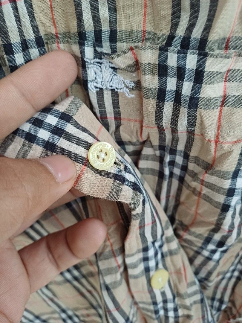 Vintage Burberrys Plaid Polo (Category: Luxury Apparel) located in Davao. Submitted by phgrails082 (Listing ID 1465954100, Image 3). Description: Vintage Burberrys Plaid Polo Large to XL , 23w x 29L Good as new condition 1,300 add shipping fee.